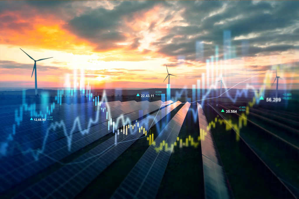 Courbes de prix du marché de l’électricité sur fond d’éoliennes et d’installations photovoltaïques au coucher du soleil illustrant le marché spot de l’électricité.